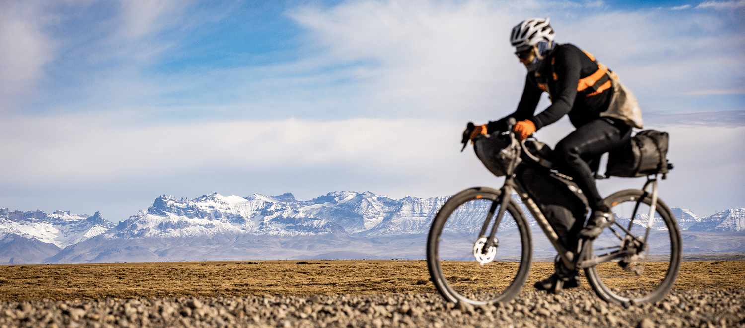 Cyclist riding along legendary Patagonia roads